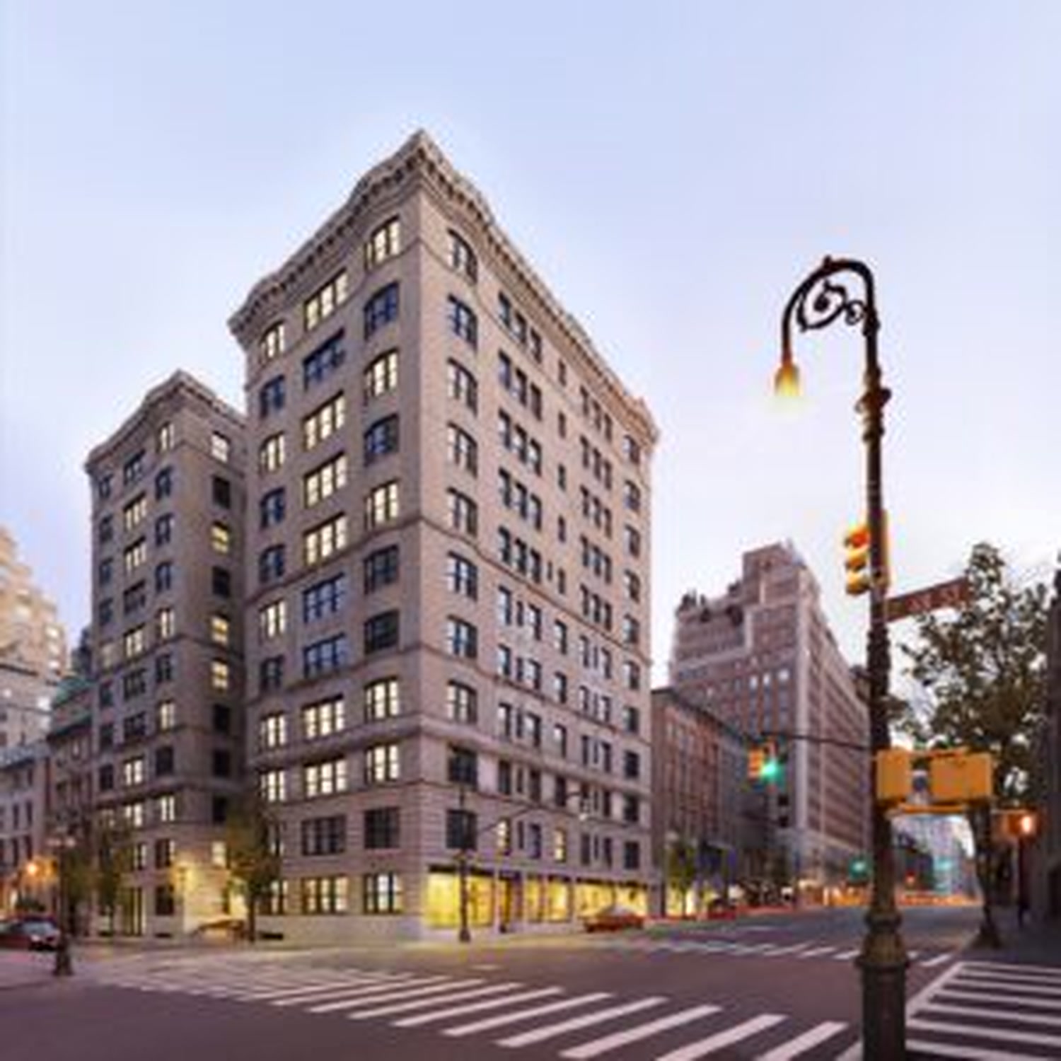 The Marquand limestone facade at Madison Avenue and East 68th Street at dusk