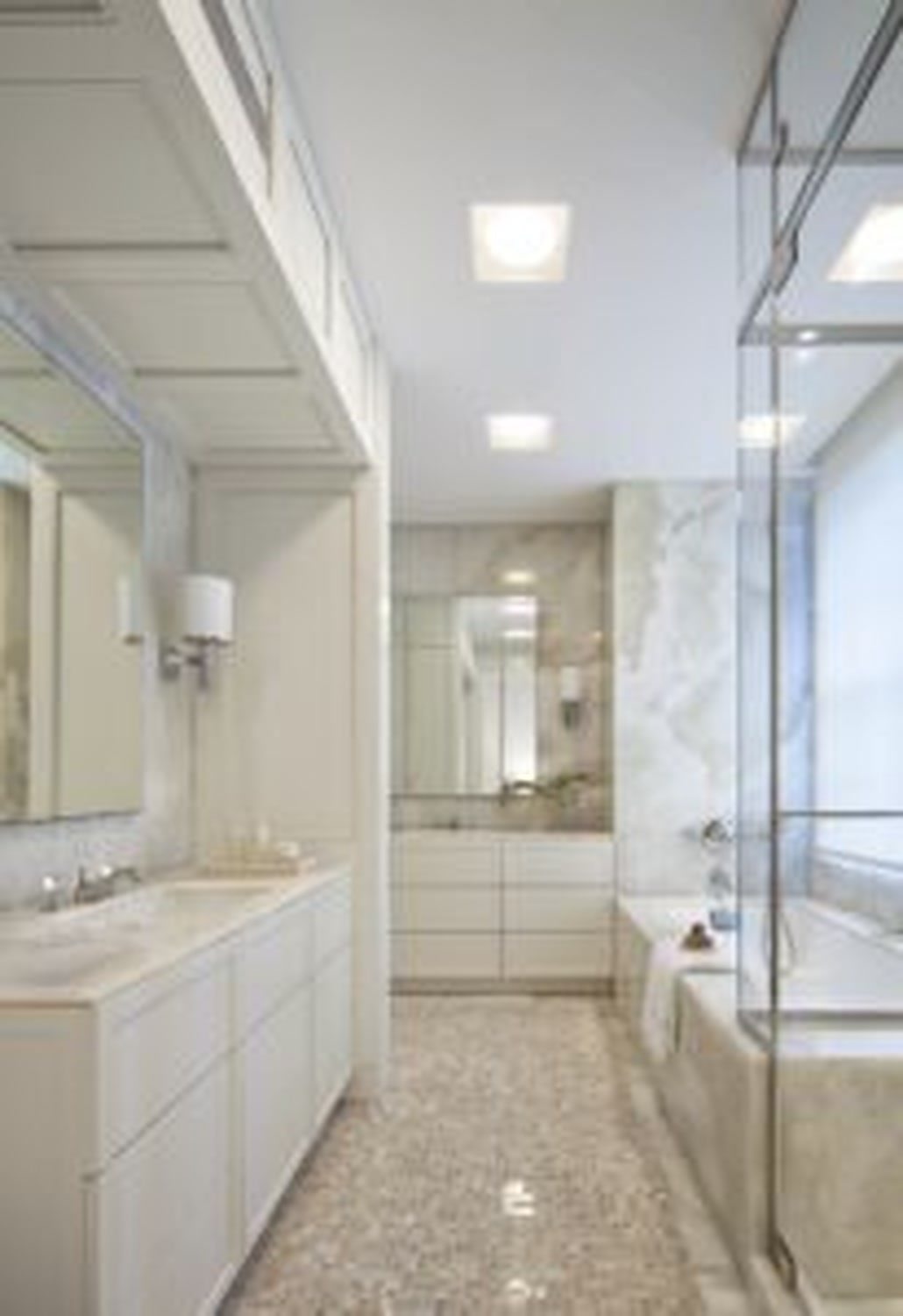 Thumbnail: Onyx and marble bathroom with soaking tub, glass shower and mosaic floor